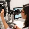 Research Assistant, Noor-Us-Sabah Ahmad, MD, using the Eyesi Slit Lamp