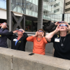 Ophthalmology staff safely viewing the solar eclipse on  August 21, 2017