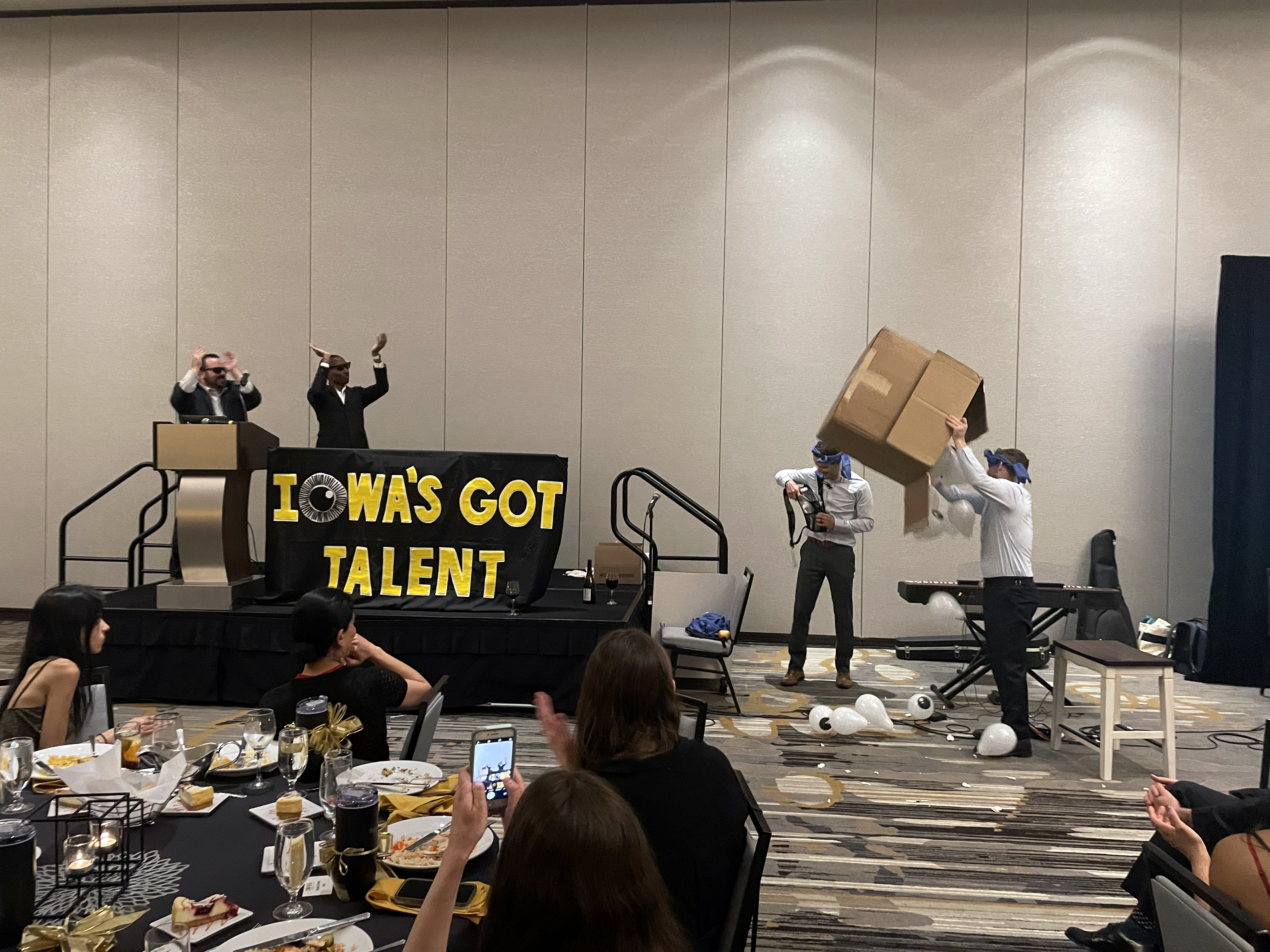 Residents Andrew Goldstein, Aaron Dotson, Sean Rodriguez, and Zachary Mortensen participate in "Iowa's Got Talent" at the Friday Banquet, Iowa Eye Annual Meeting and Alumni Reunion