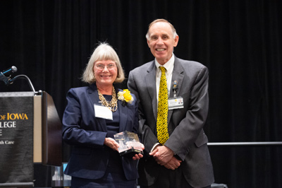 Kathleen Digre receiving Distinguished Alumni Award