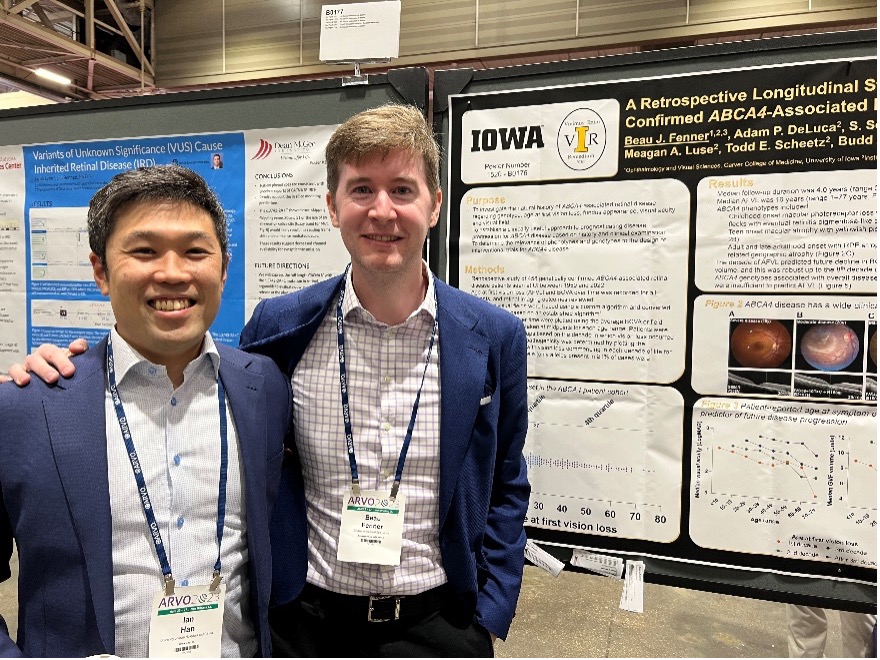 Dr. Fenner presenting his poster at ARVO 2023, with retina faculty Dr. Han