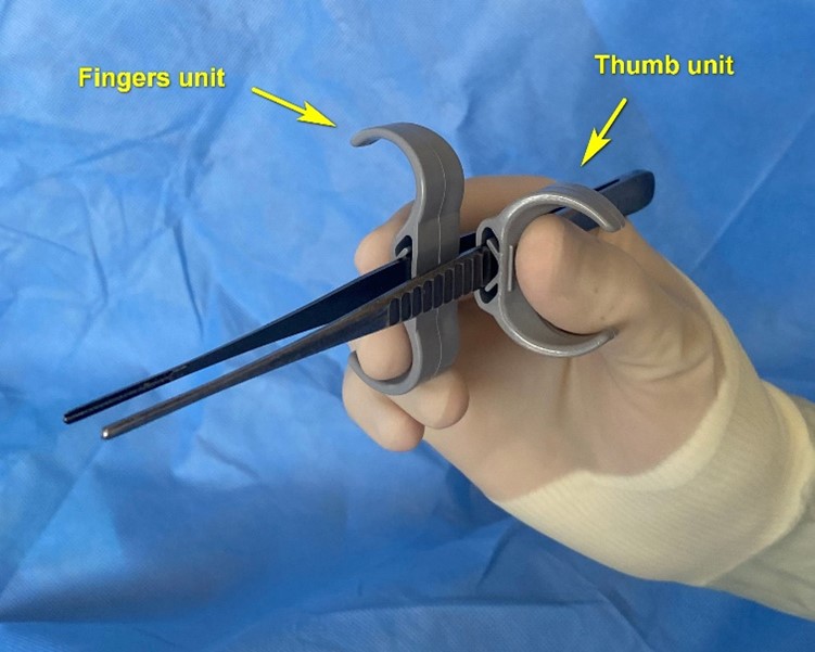 Ergonomic attachment for surgical forceps increases steadiness of manipulations and surgeon’s comfort