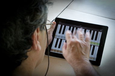 Person playing digital piano