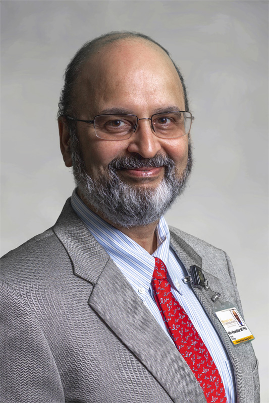 Dr. Karandikar