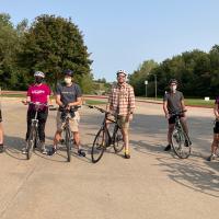 Biking: Fellows biking through Coralville and North Liberty.