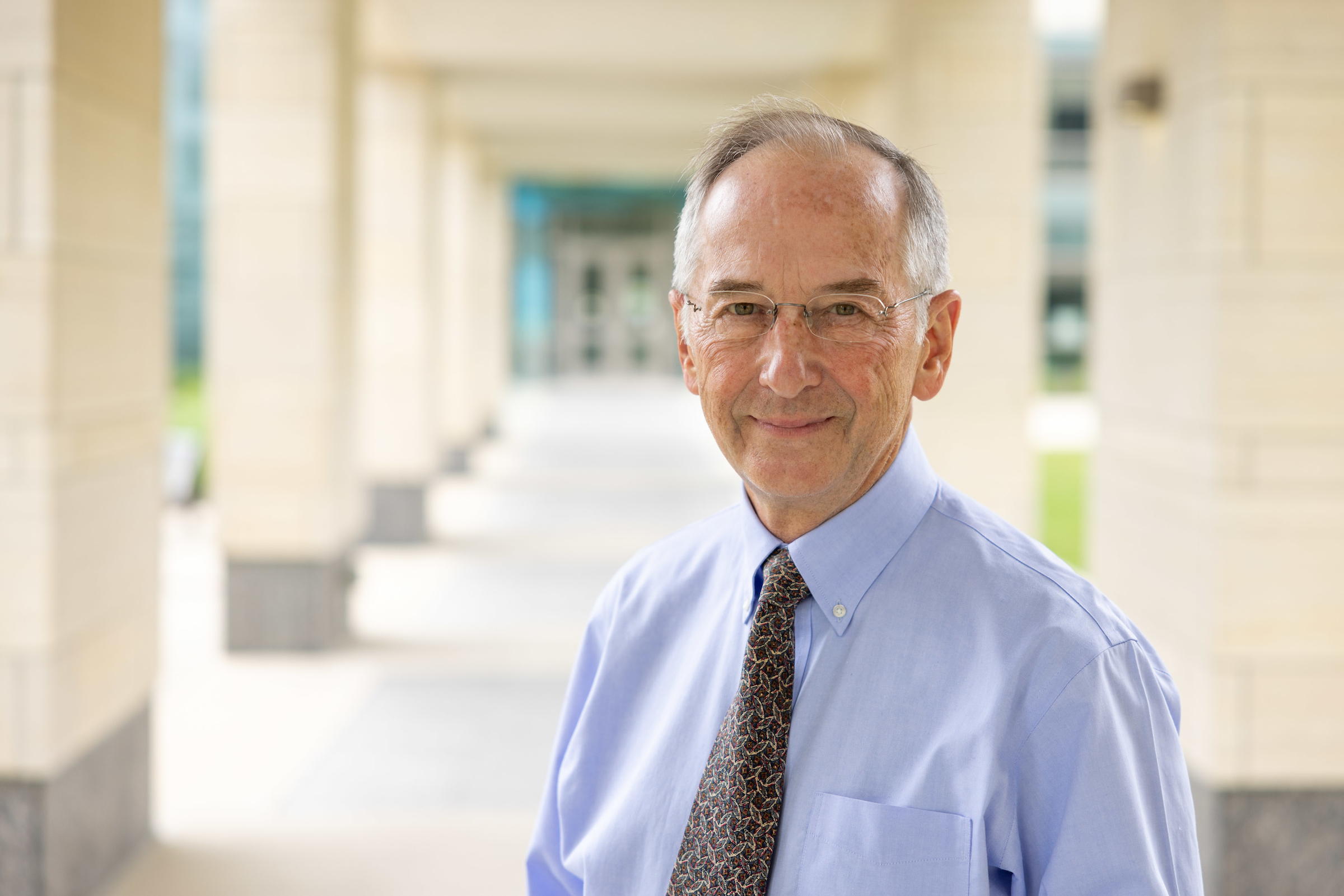 Portrait of Dr. Michael Welsh outdoors on the University of Iowa Carver College of Medicine campus