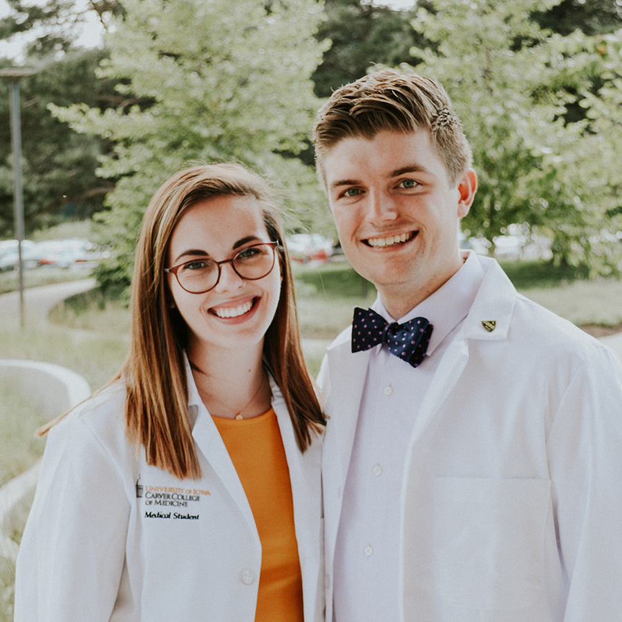 Jimmy and Nicole in their white coats