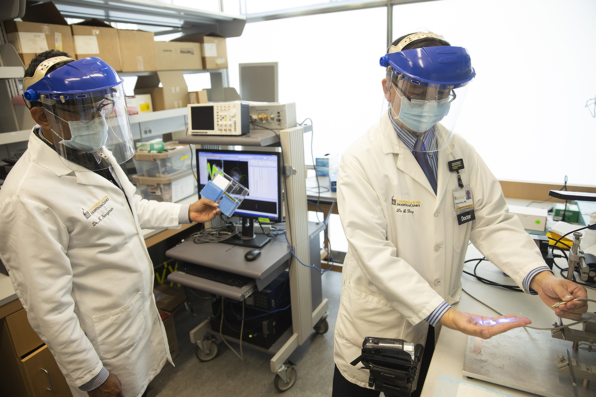 Qiang (Johnson) Zhang and Kumar Narayanan at work in the lab