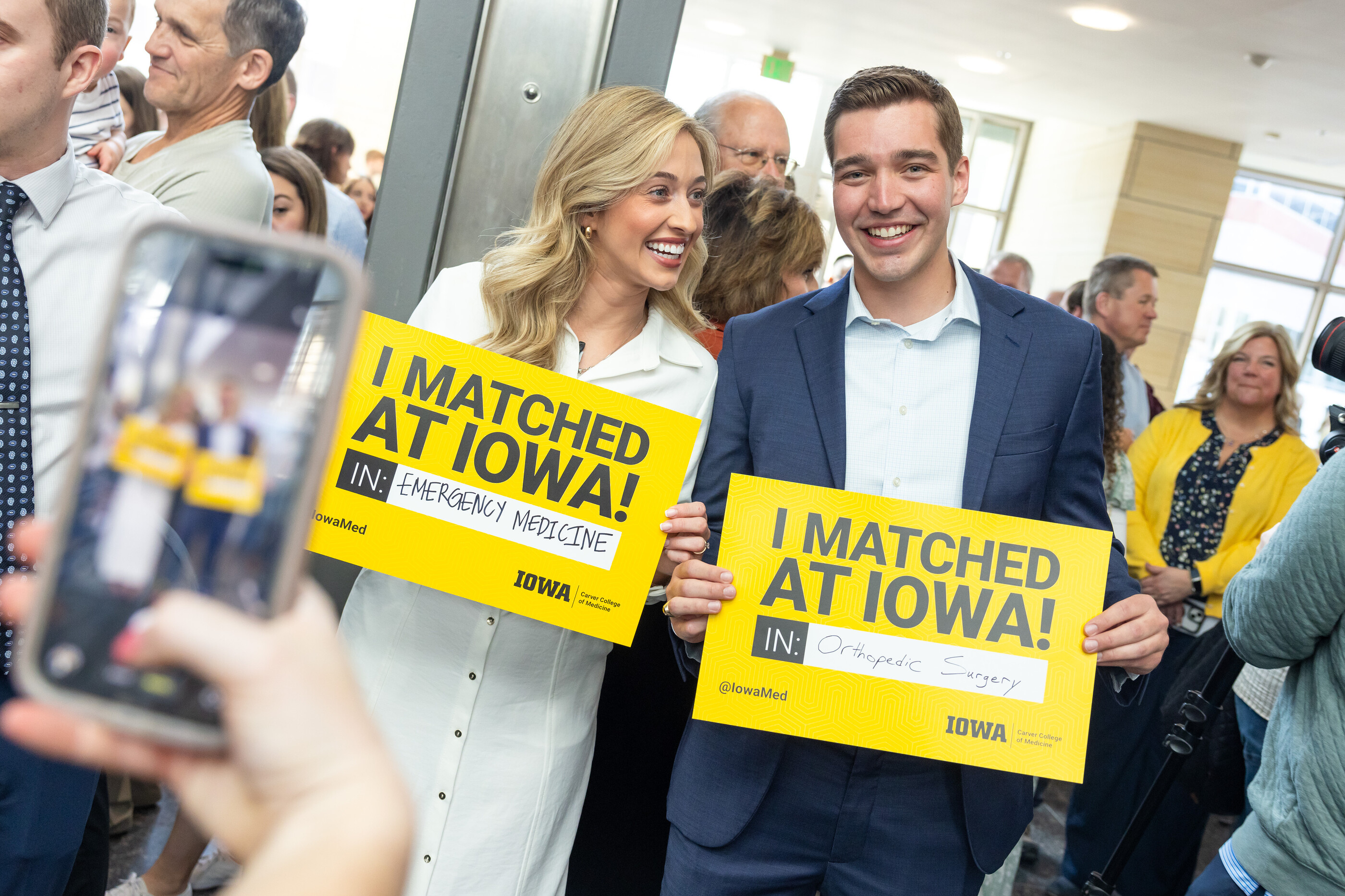 Two MD students celebrating match day 2026