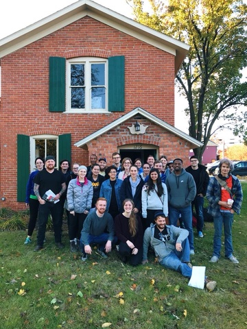 Hooyer (front row, left) volunteered with the Iowa Harm Reduction Coalition, providing resources for individuals who use drugs to help them live safer lives.