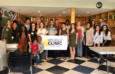 Wahba (far right, front row) was active in the UI Mobile Clinic's Pheasant Ridge site, which serves a predominantly immigrant and refugee population.