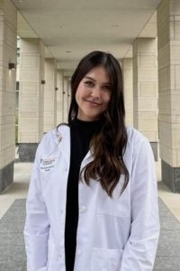 KIoe Thomas in her PA student white coat