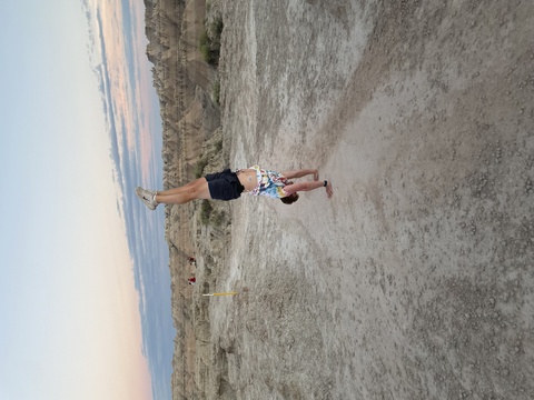 Mark Schmidt Jr. does a hand stand in the Badlands, South Dakota.