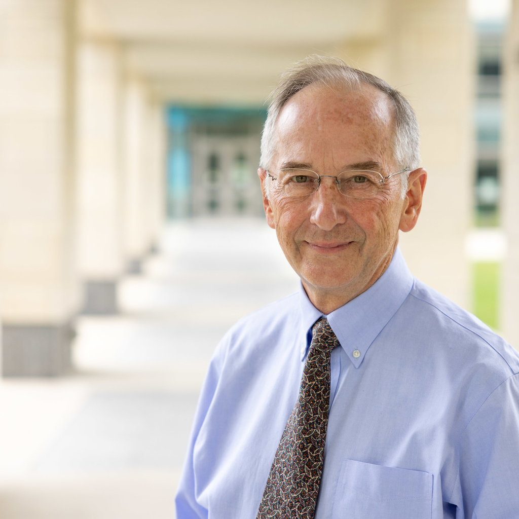 Portrait of Dr. Michael Welsh outdoors on the University of Iowa Carver College of Medicine campus Michael Welsh, MD, is recognized for his decades of research on mechanisms and treatment of cystic fibrosis.