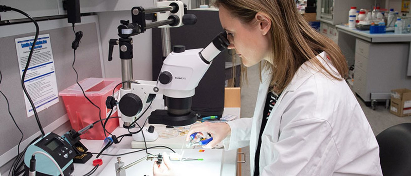 Dr. Hultman in a lab