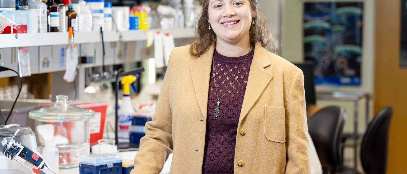 Serena (Banu) Gumuslogu, PhD pictured in lab